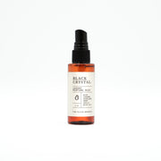 Black Crystal perfume mist bottle on a white background