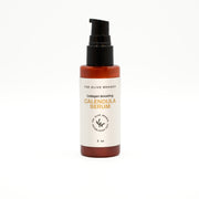 Bottle of The Olive Branch Calendula Serum on a white background