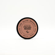 Facial mask container with 'The Olive Branch' branding on a white background