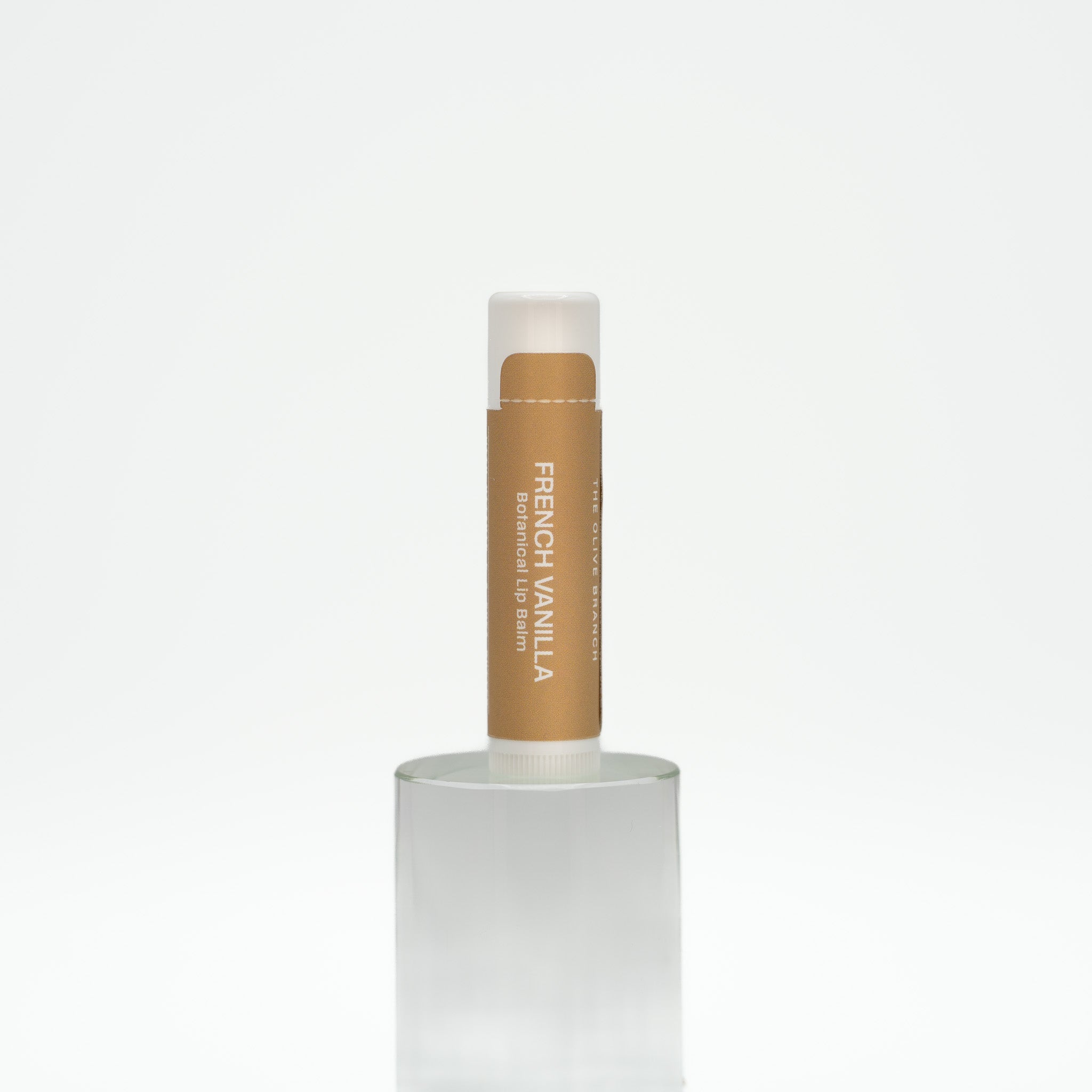 Lip balm with 'French Vanilla' label on a white background