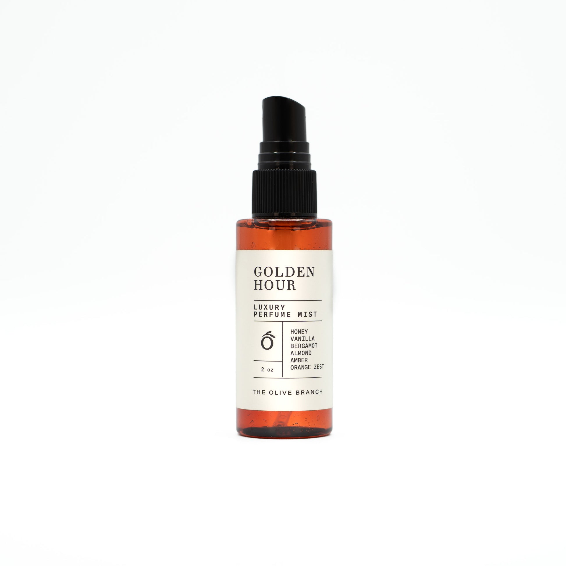 Perfume mist bottle labeled 'Golden Hour' on a white background