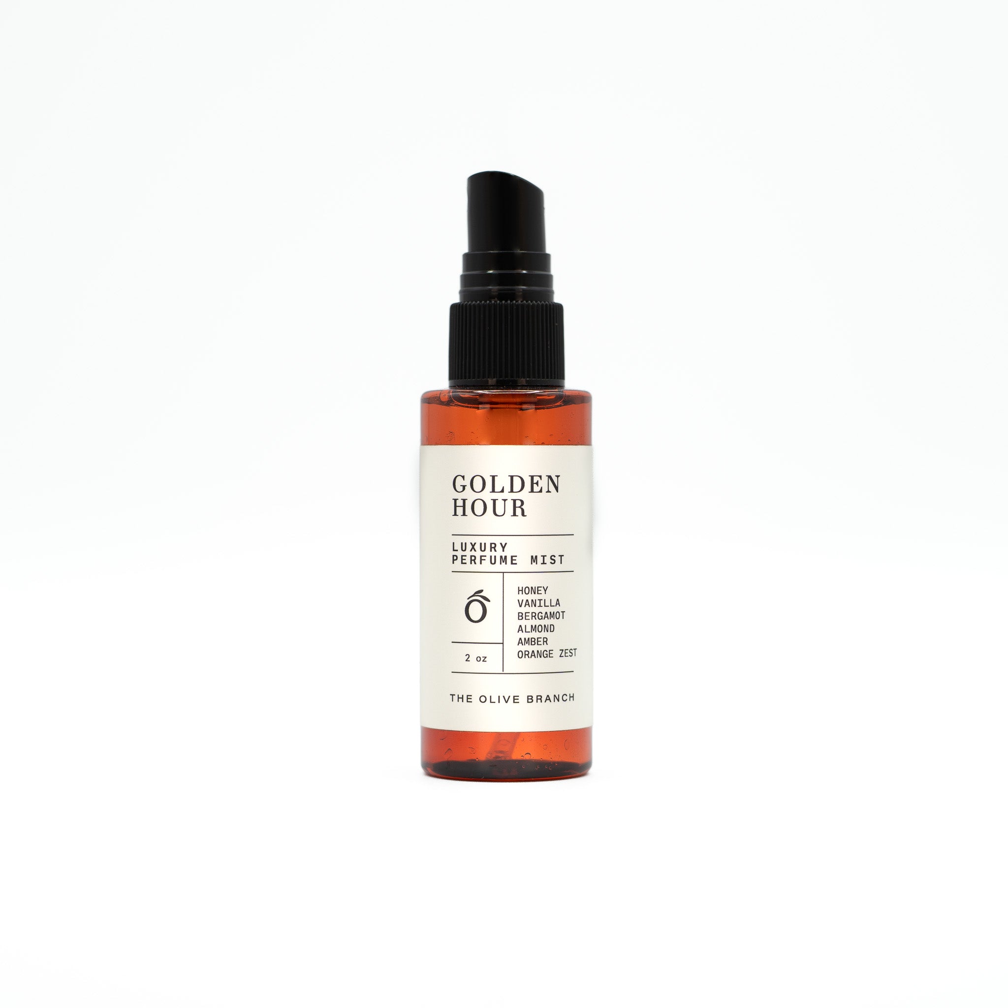 Perfume mist bottle labeled 'Golden Hour' on a white background
