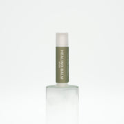 Healing balm container on a white background