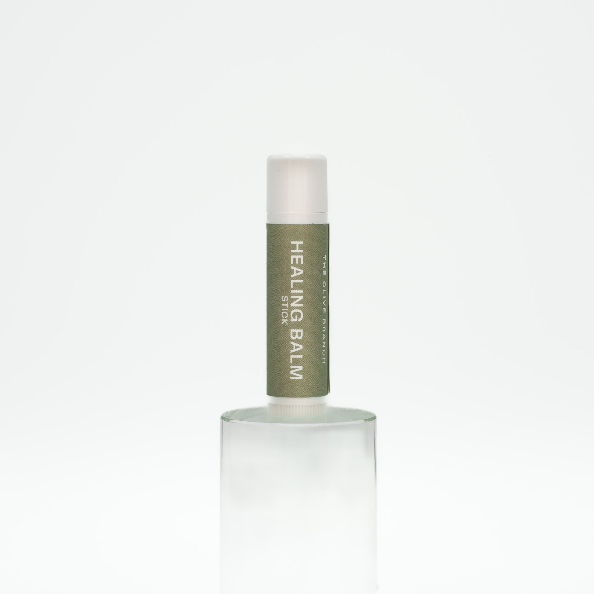 Healing balm container on a white background