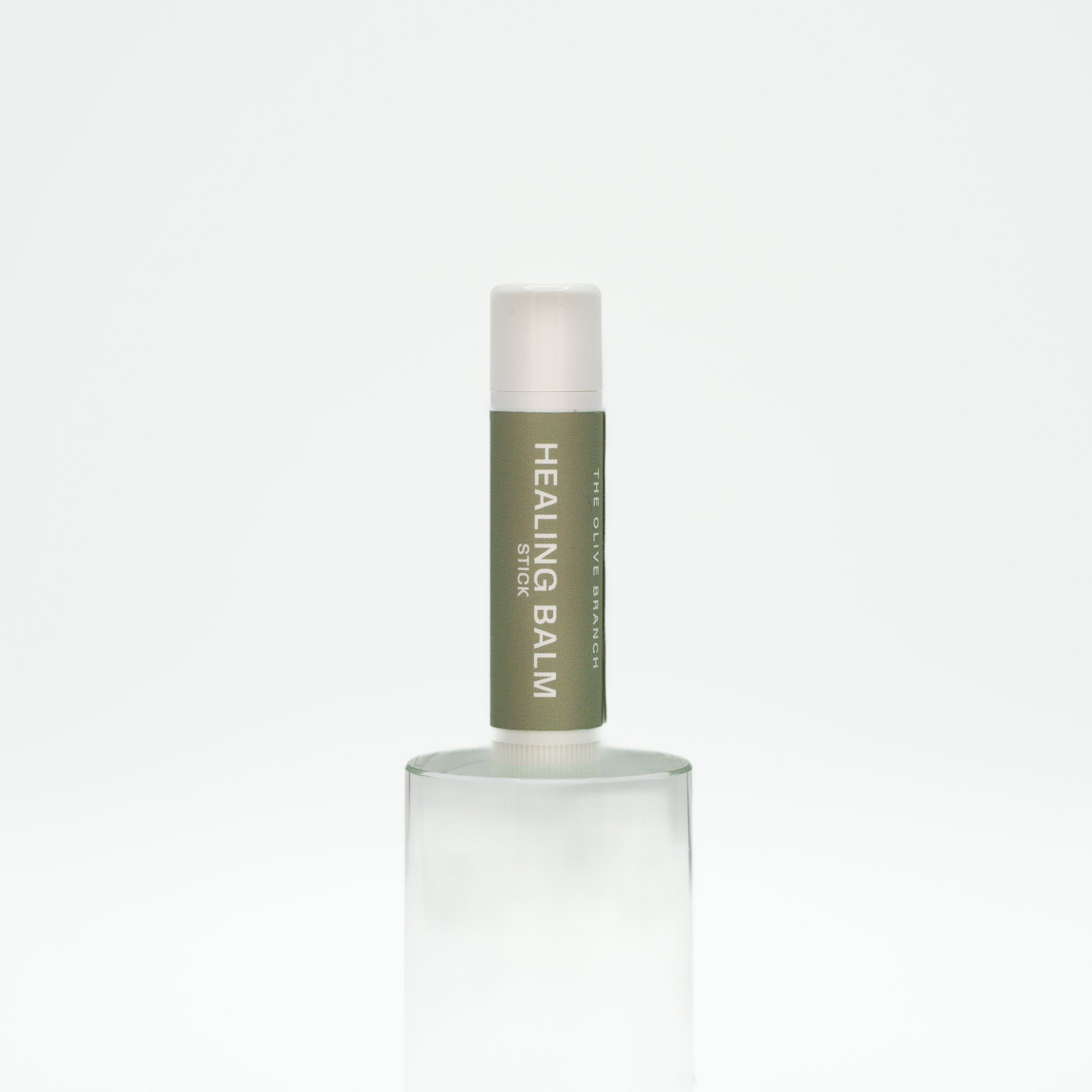Healing balm container on a white background