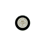 Lip mask container with a white label on a white background