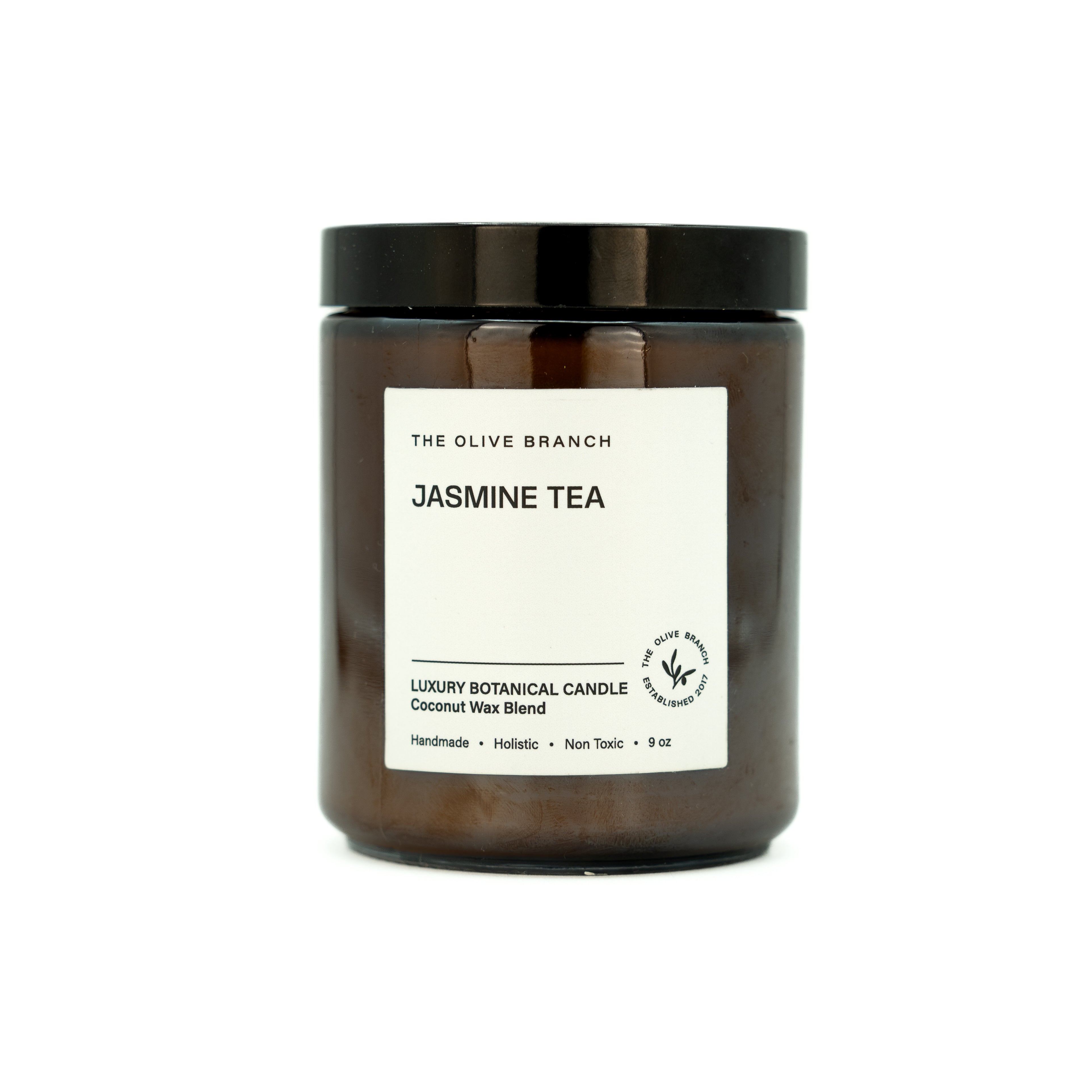 Candle jar labeled 'Jasmine Tea' by 'The Olive Branch' on a white background