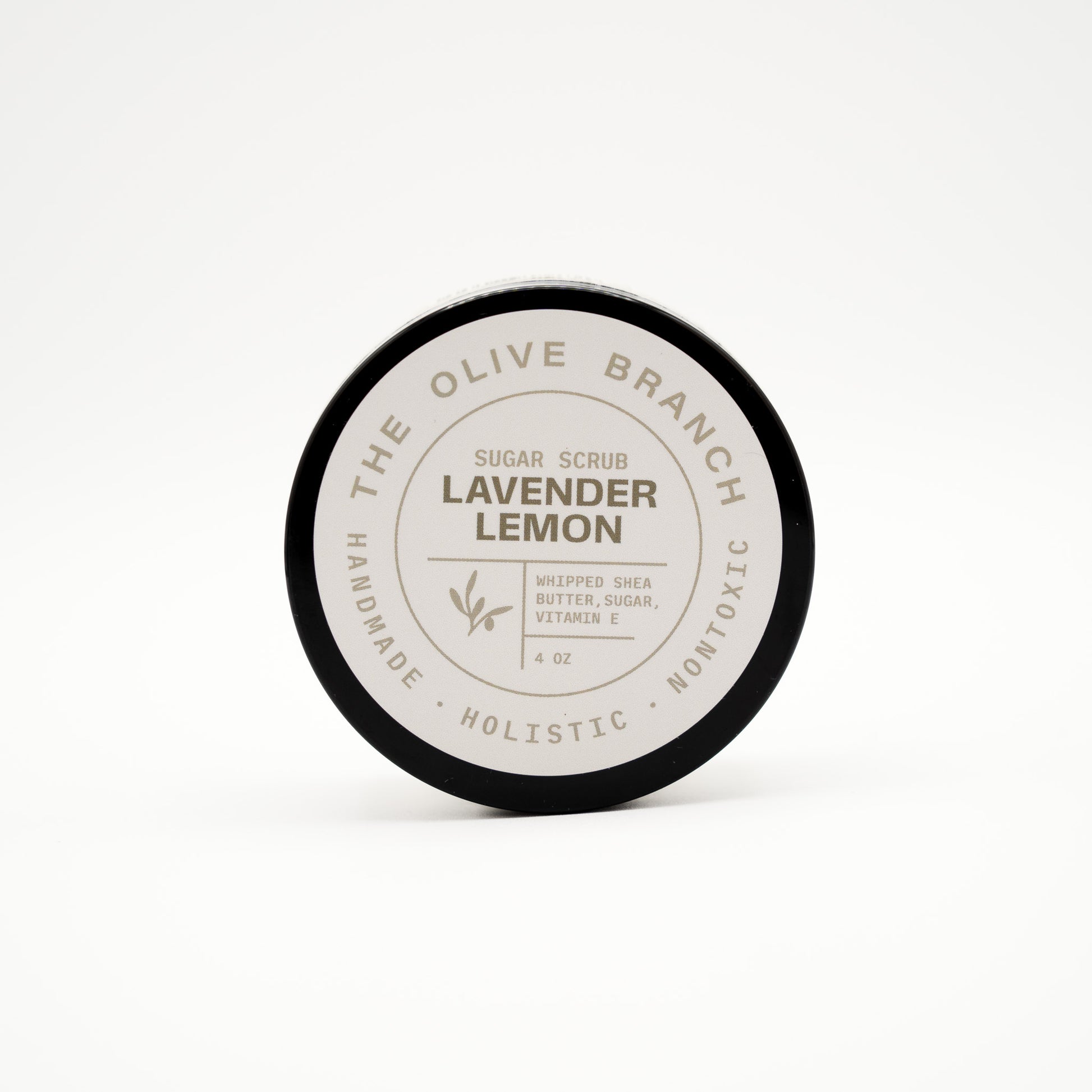 Jar of lavender lemon sugar scrub from The Olive Branch on a white background