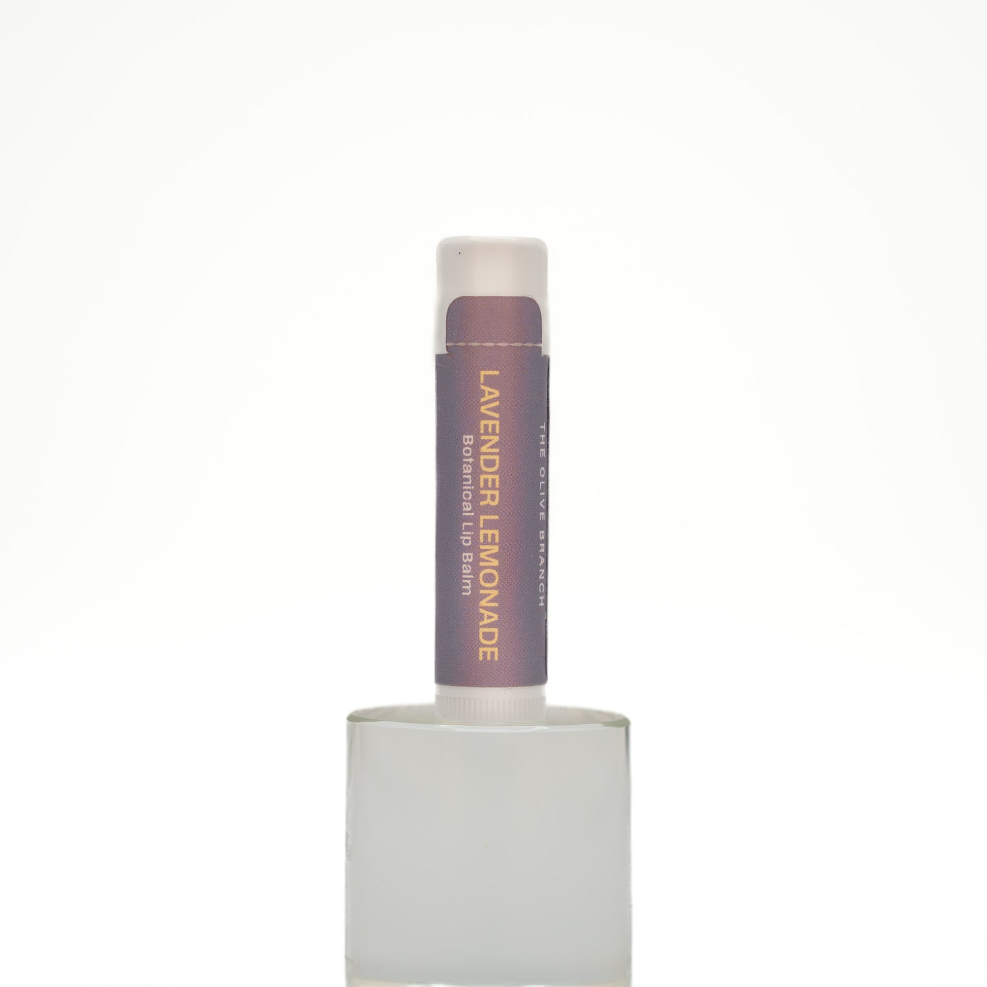 Lavender Lemonade lip balm on a white background