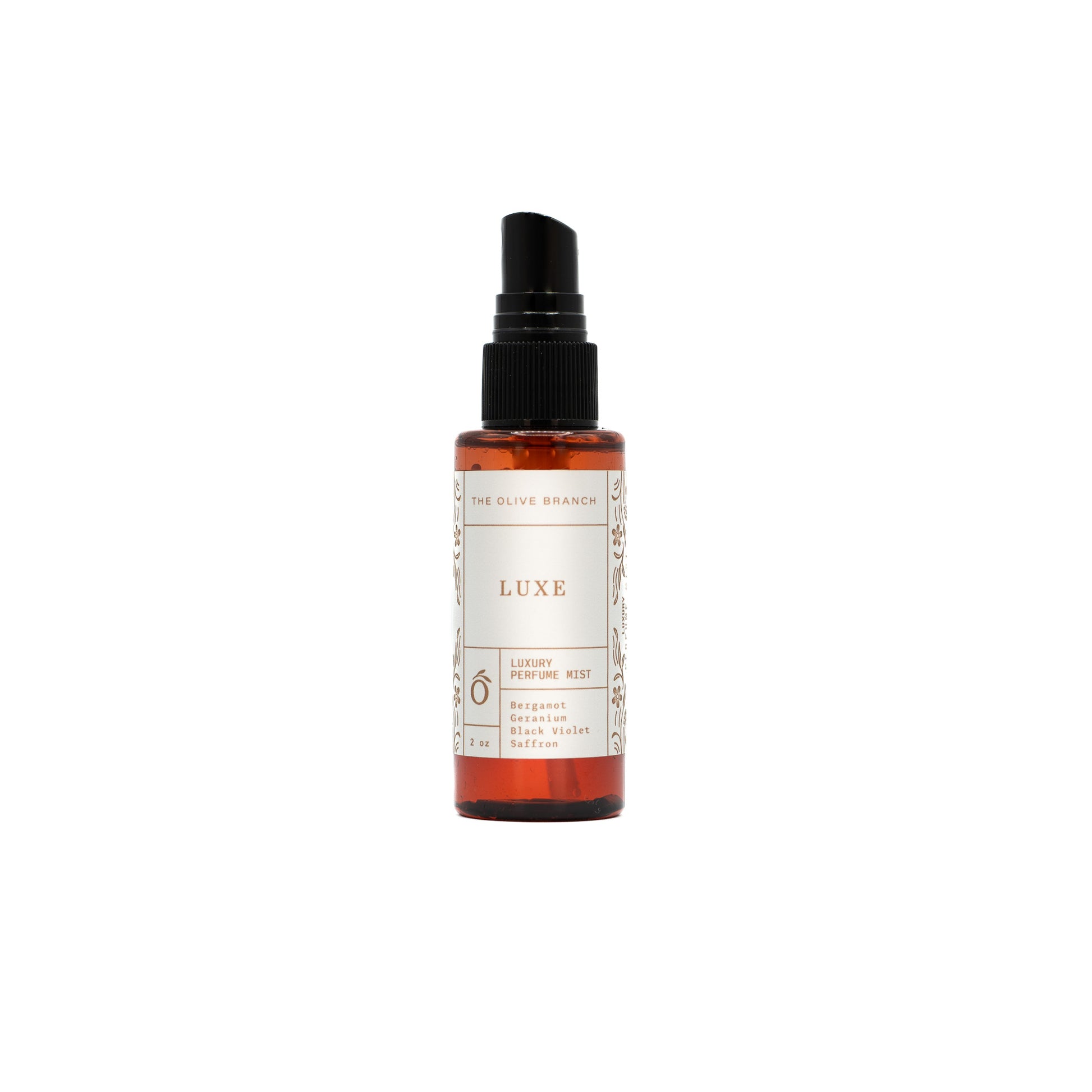 luxe perfume mist bottle on a white background