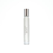 Luxe luxury perfume oil on a white background