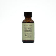 Bottle of The Olive Branch cleaner concentrate on a white background