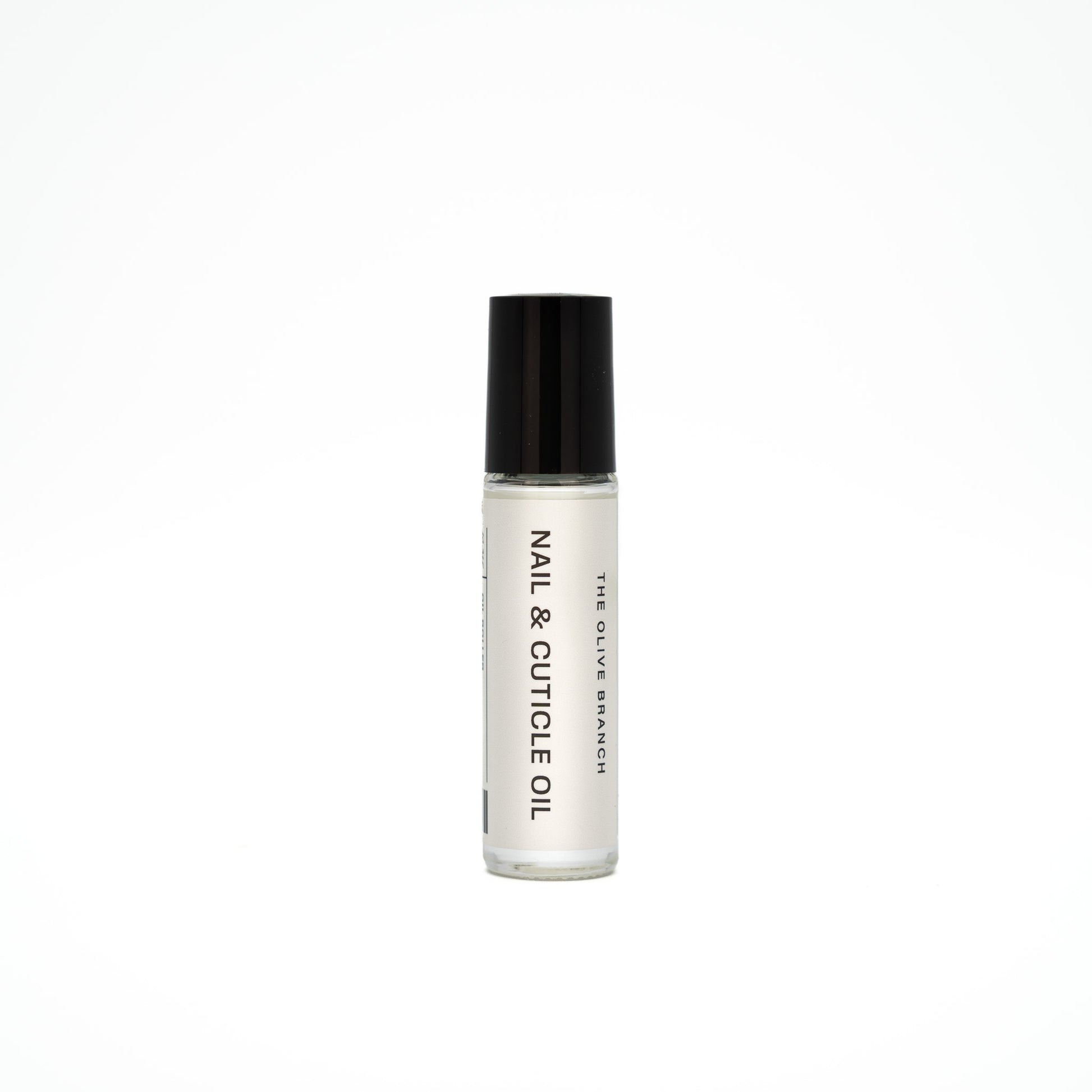 Nail and cuticle oil bottle with black cap on a white background