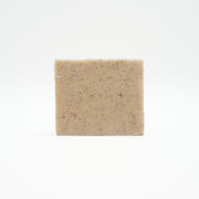 Square bar of Penny's Puppy Bar soap on a white background