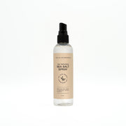 Sea salt hair spray bottle with label on a white background