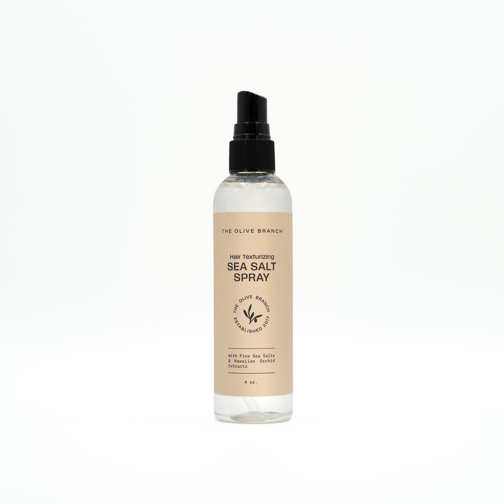 Sea salt hair spray bottle with label on a white background