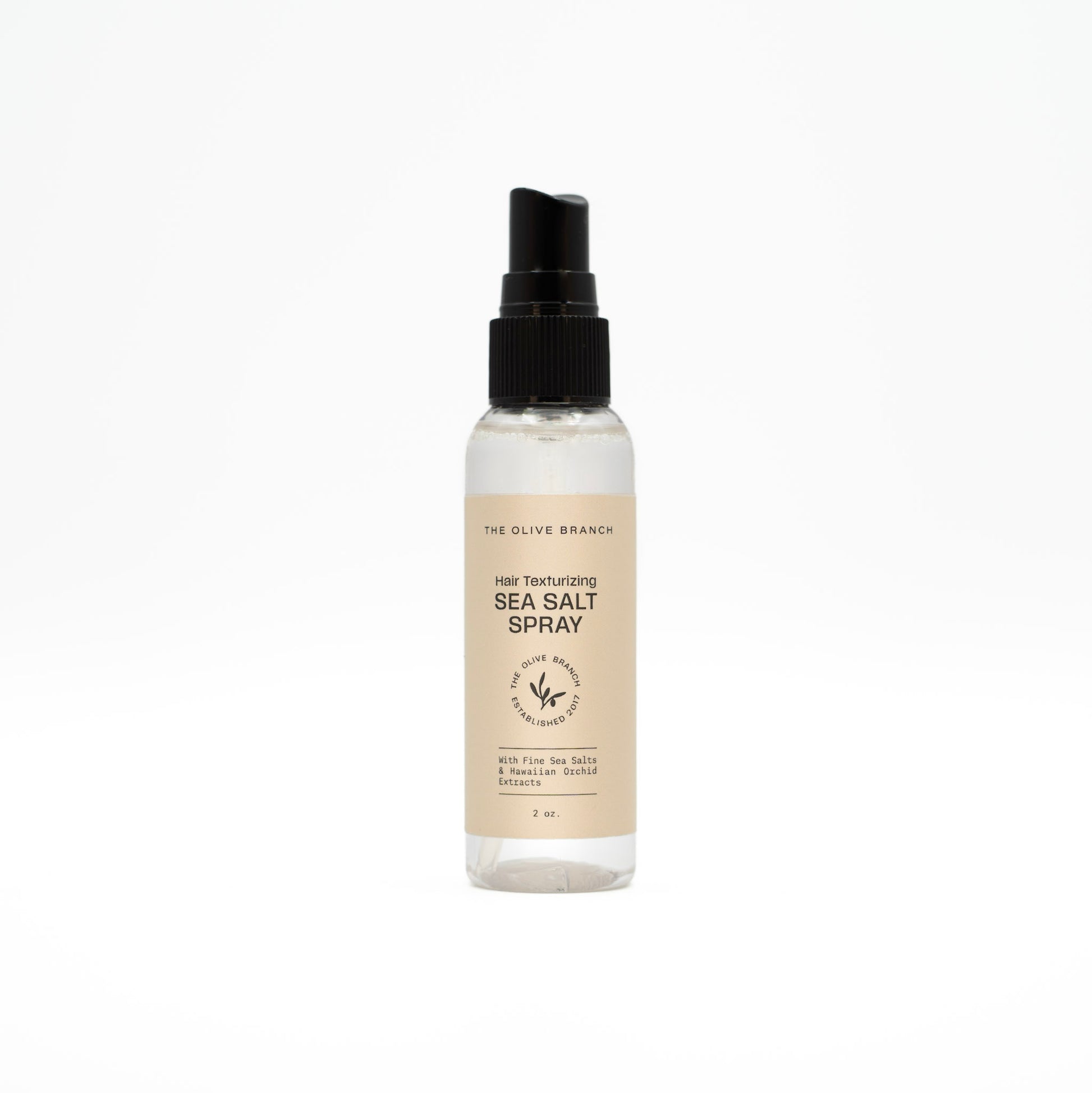 Sea salt hair spray bottle with label on a white background