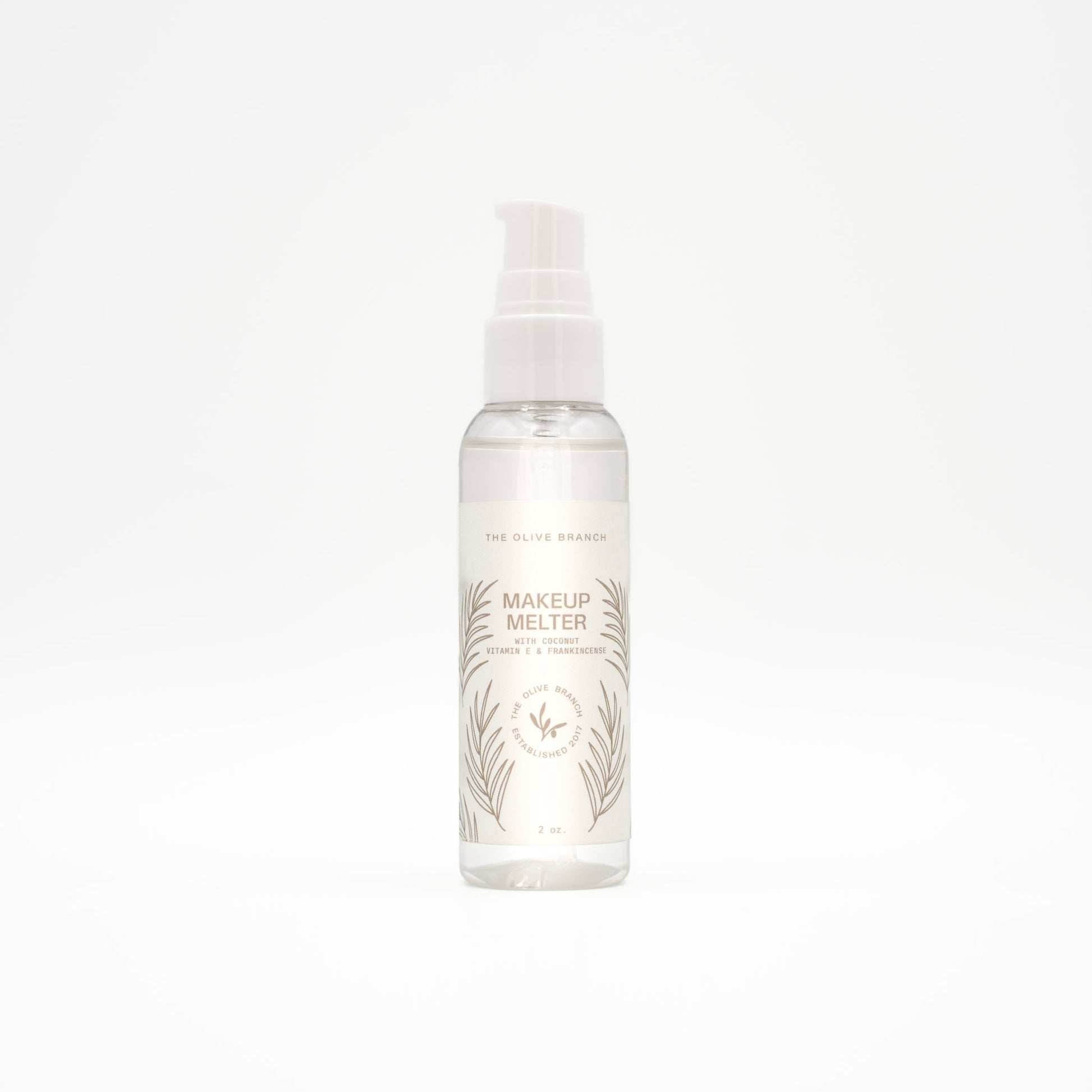 Clear bottle labeled 'Makeup Melter' on a white background